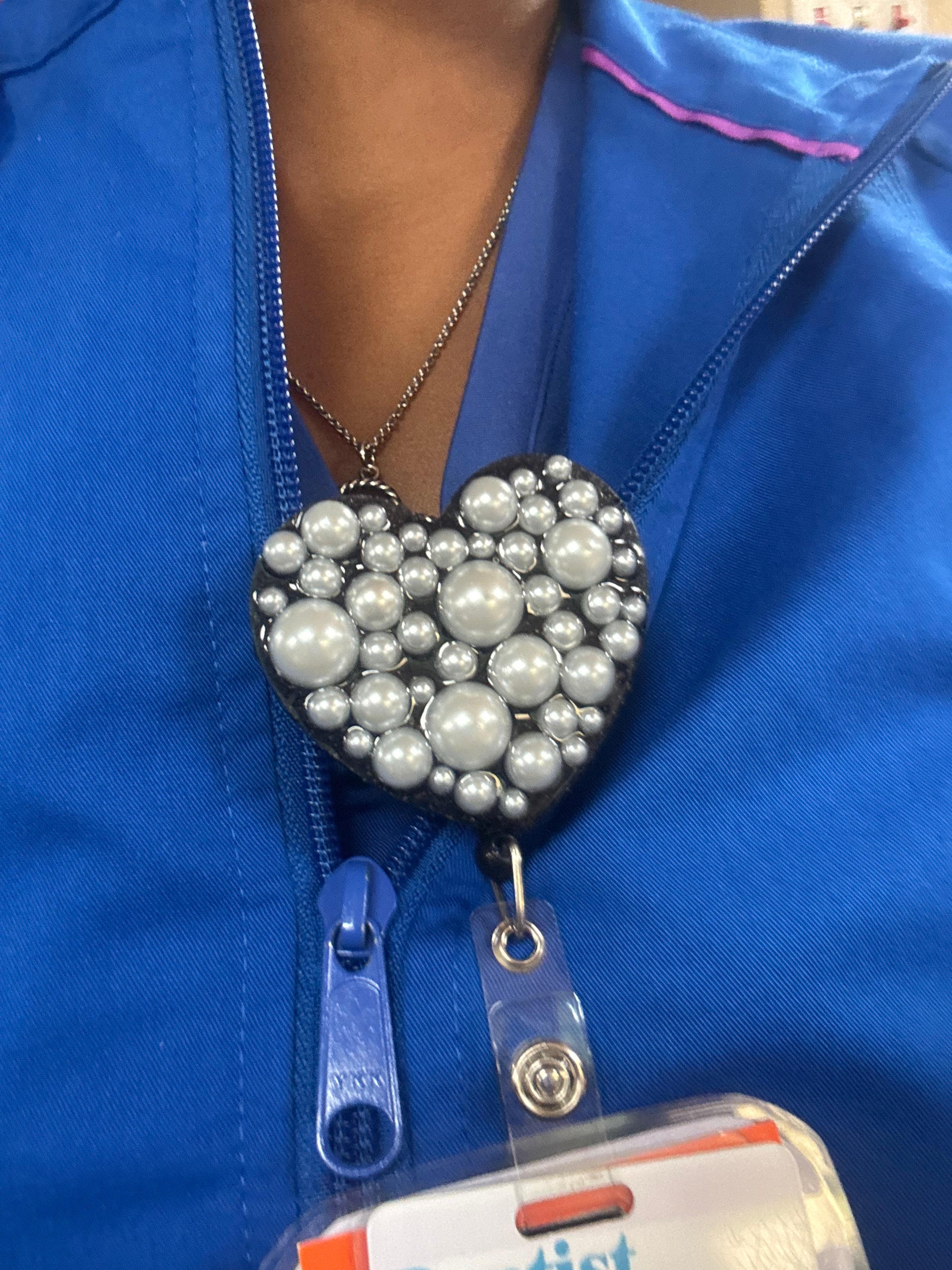 Heart shaped badge reel